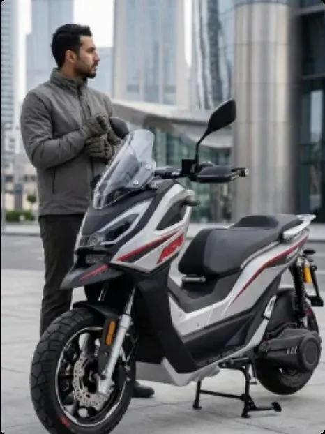 Rider beside a Swap Energy electric motorcycle
